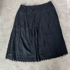 Ellos: Tiered broomstick skirt crocheted trim.